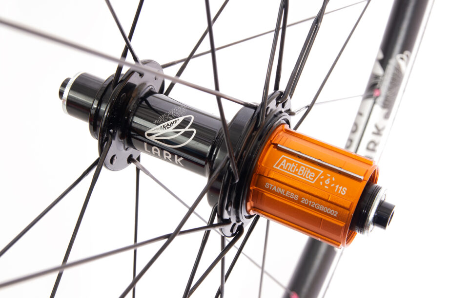 Lark Light rear hub with etched design and 2:1 lacing