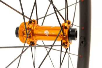 orange straight-pull centre-lock disk hub