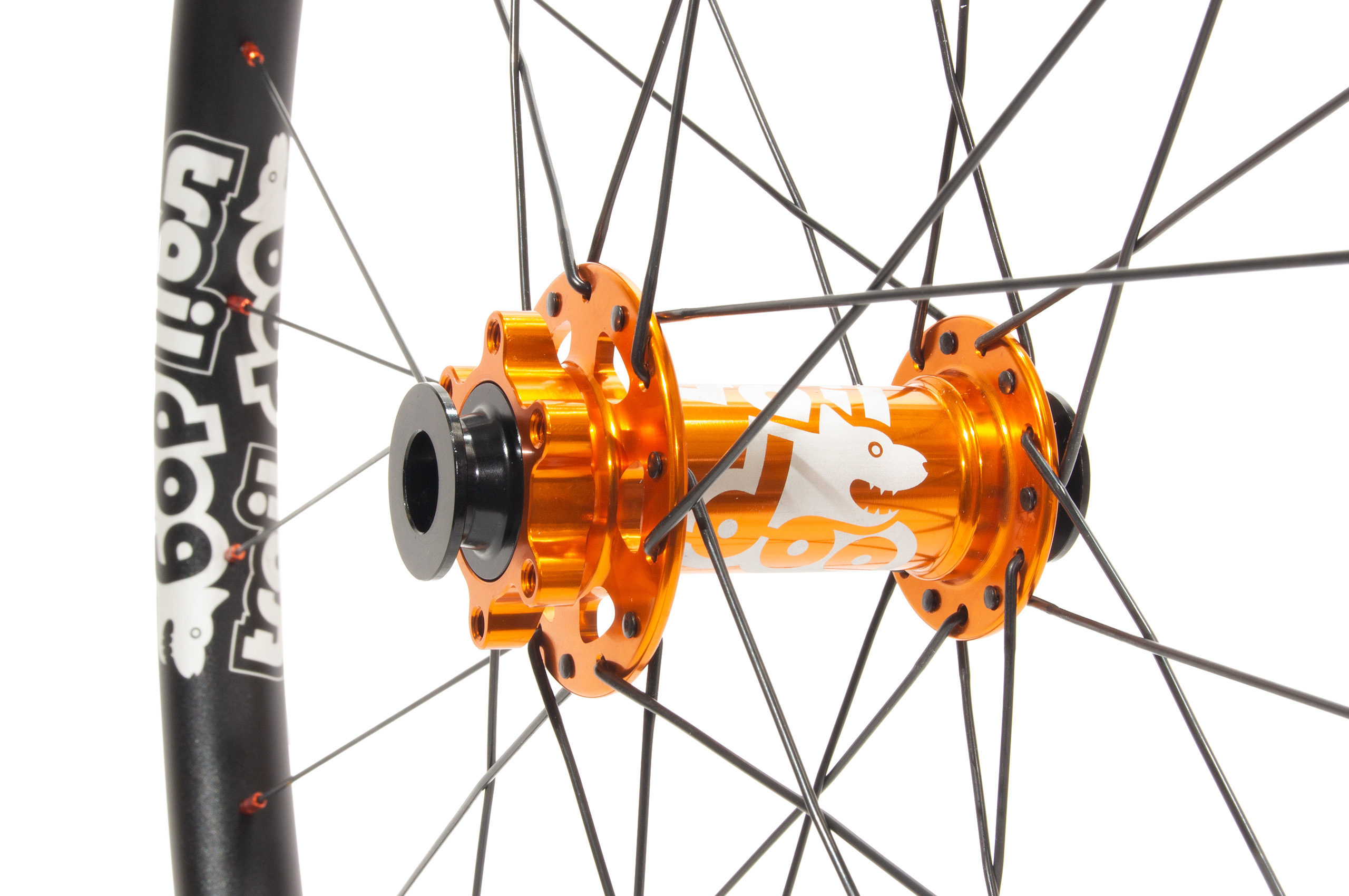 Traildog wheelset with orange boost J-bend hub fitted with torque end-caps