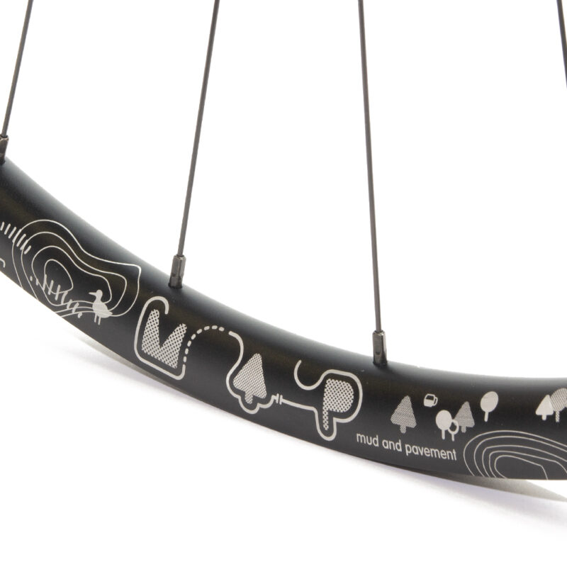 Map rim with original etched design and black spoke nipples