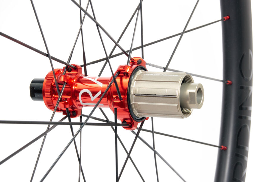red straight-pull centre-lock disk hub with JRA etching