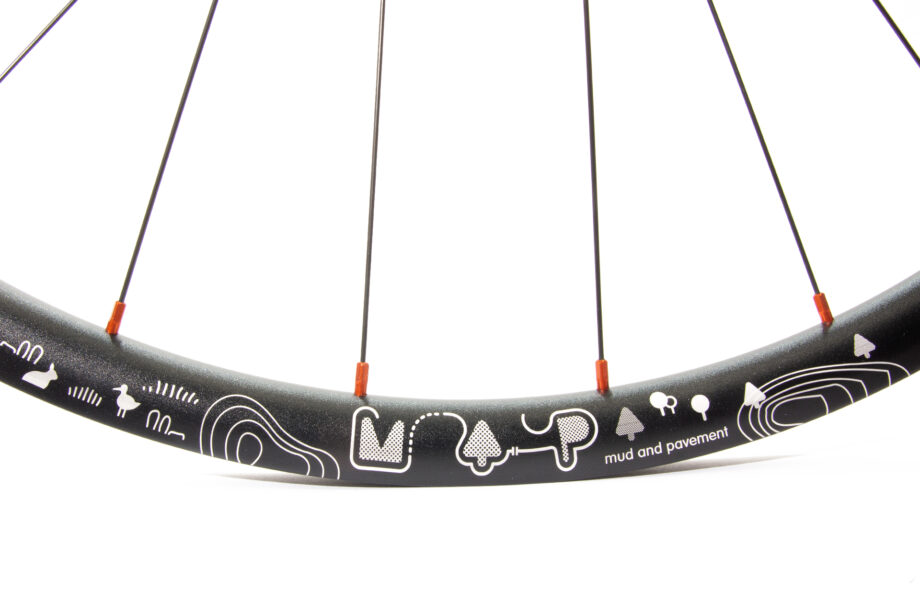 Map etched rim with orange spoke nipples