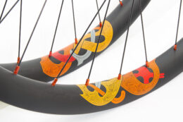 Knarr carbon rims with orange nipples and orange water transfer rim decals